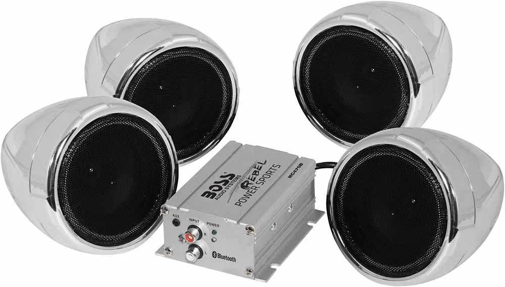 Four chrome Boss speakers suitable for a motorcycle