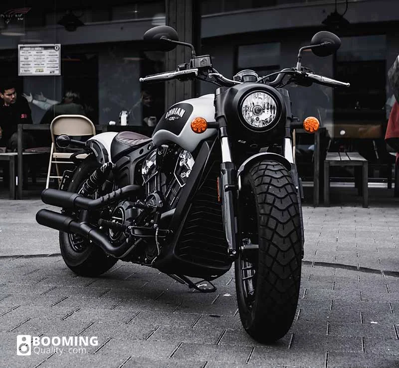 Black and grey motorcycle on stand